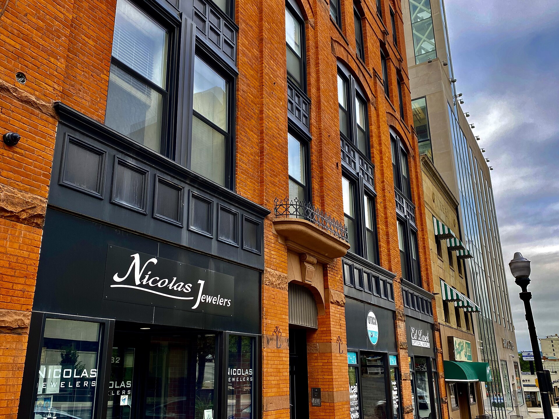 Row of storefronts on Genesee Street in downtown Utica